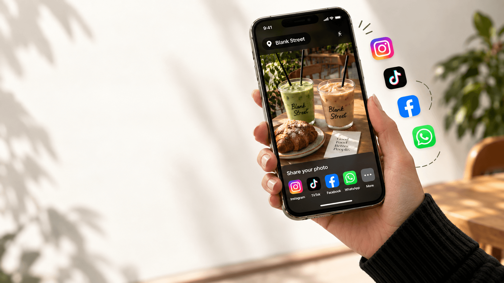 A customer sharing a branded café photo from UGC Camera